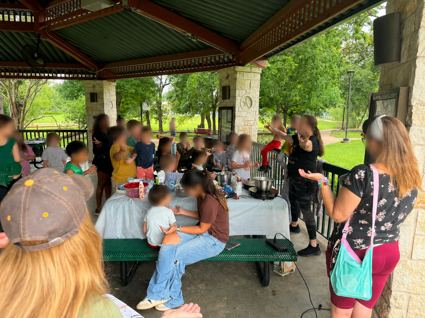 Families gathered together at a CurioSpark community event