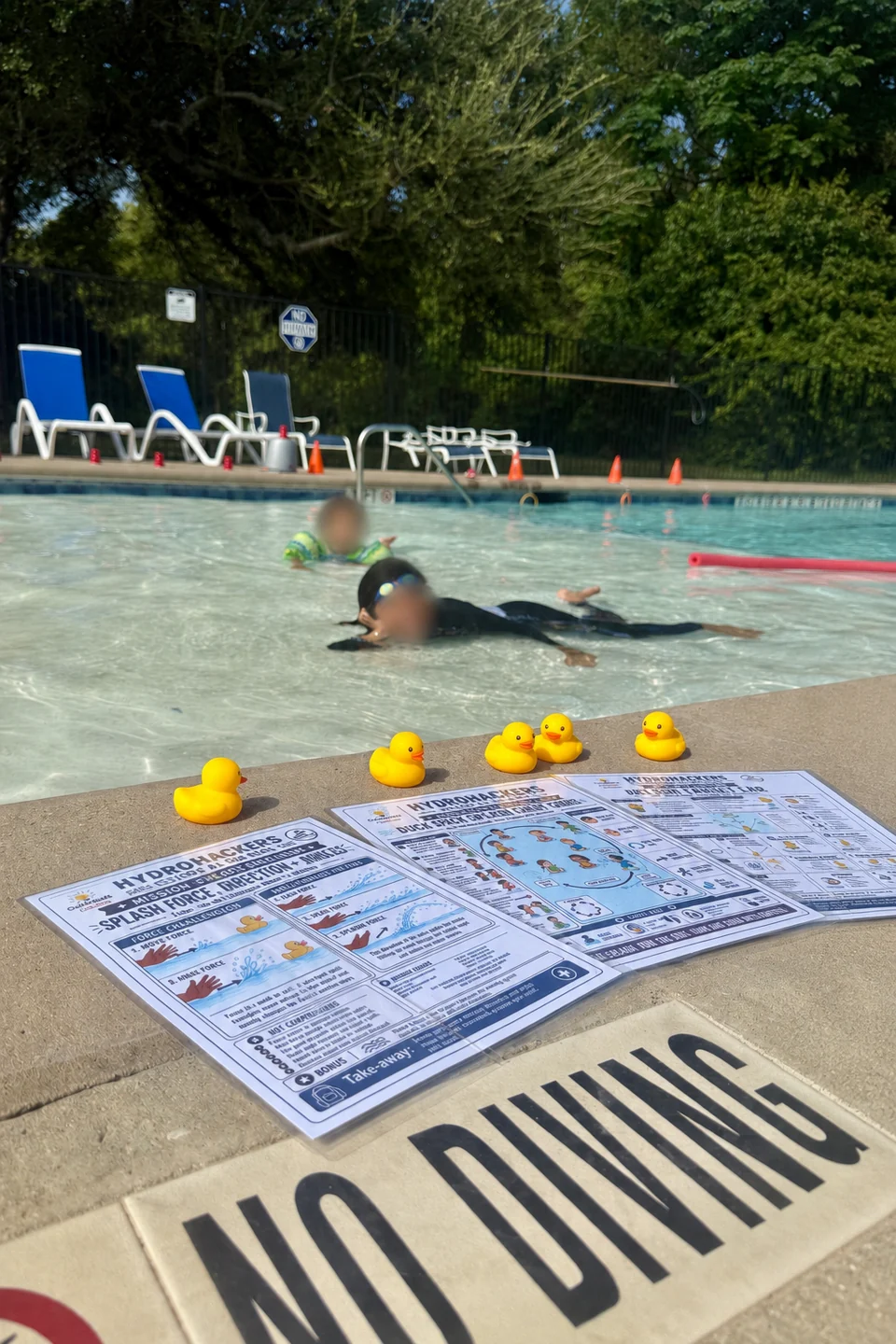 CurioSpark water-science materials beside children exploring in a pool