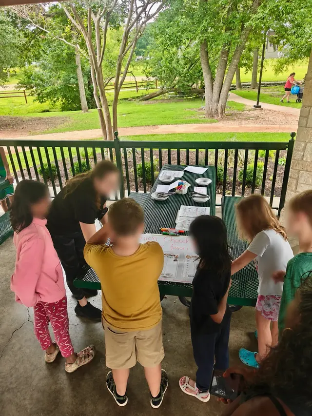 Children working together on a CurioSpark project